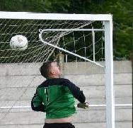 Barry Poskett lets a cross drop over the bar