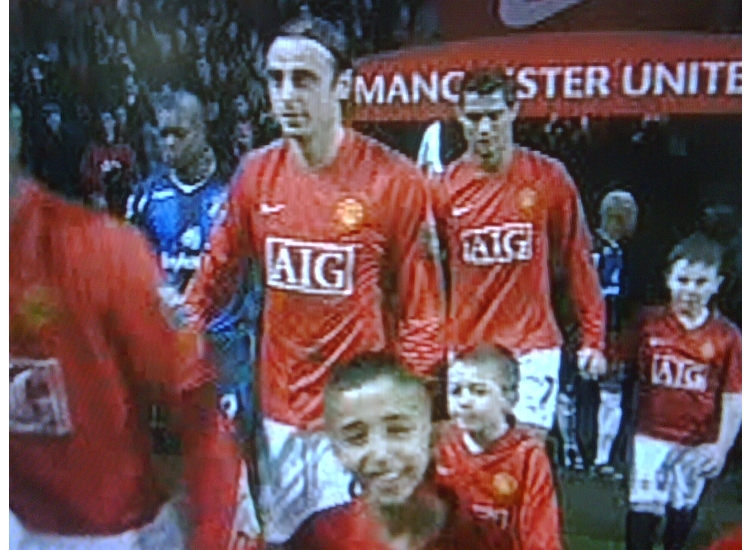 U7 OZ LEADS OUT BERBATOV UTD V SUNDERLAND