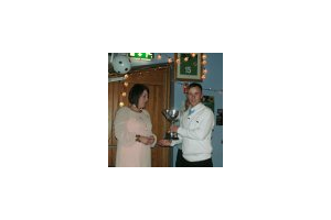 BRYAN RECIEVING PLAYER OF THE YEAR ON BEHALF OF STEPHEN TOSH