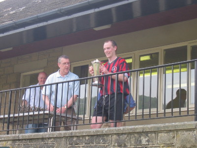 Skip lifts the cup!