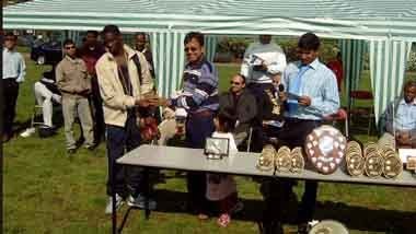 Micheal Begg recieving the young player of the year award 2003/2004 for outstanding goal scoring tally to aid the team to its first league title