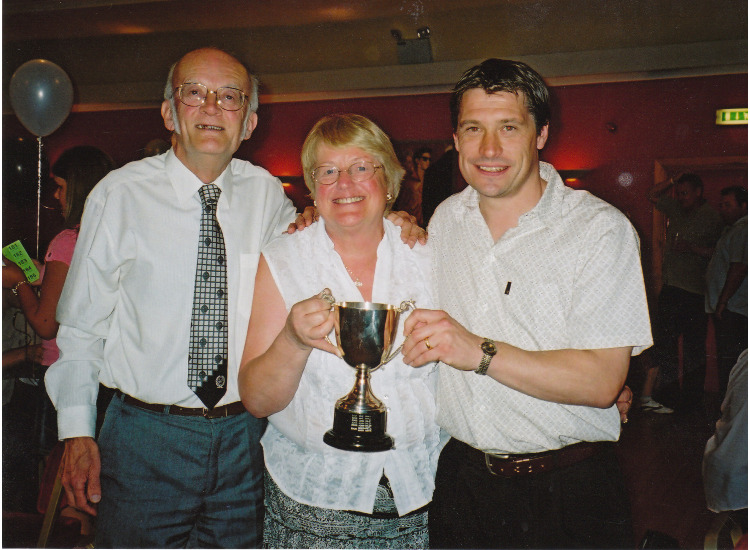 Tony Cottee presenting the Bob Spurgin award to Margaret Agate (Vice-Chairman) and Mark Agate (President)