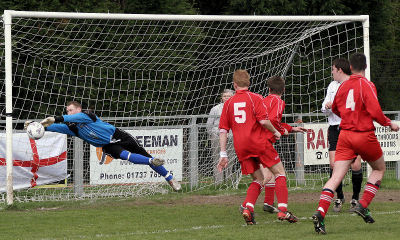 Keeper Dan Kelton in action pulling of a great save