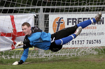 Close up of Keeper Dan Kelton at full stretch