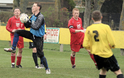 Keeper Dan Kelton save away at Littlehampton
