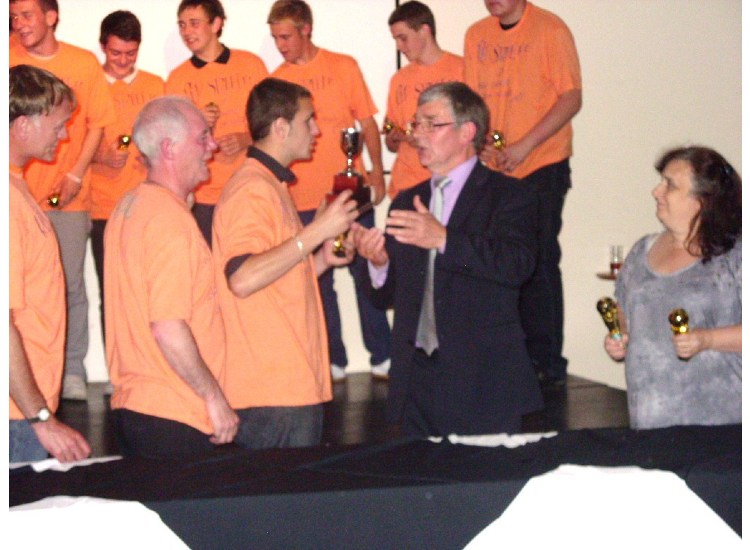 DODDY COLLECTS THE LEAGUE CHAMPIONSHIP TROPHY