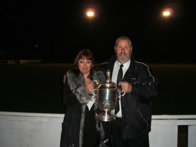 Steve and Margaret Coxon hold the Durham FA Trophy, won at Dunston Federation FC in April 2007.
