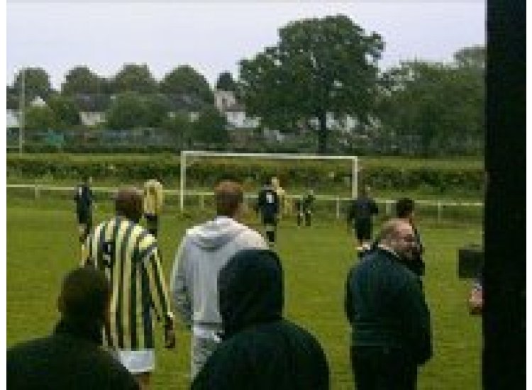 Mike and Mark watch on as the manager looks for the bar!
