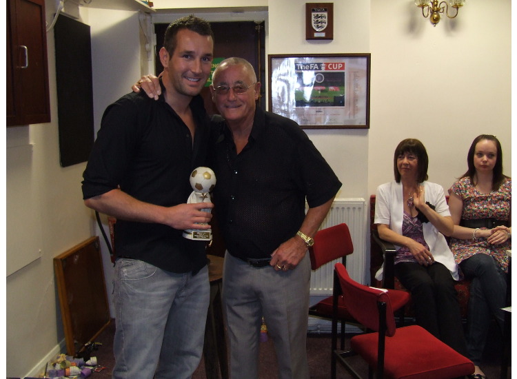 John Atkinson presents Steven Walklate with the Players Player of the Year award.