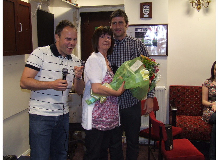 Christine Tray was given a bouquet as a token of appreciation for taking care of players' kits throughout the season.