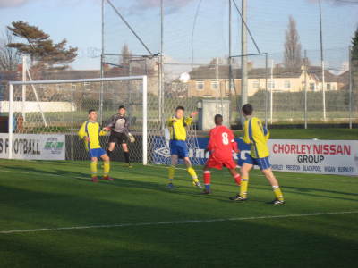 Ash looks on in amazement as Curt heads the ball