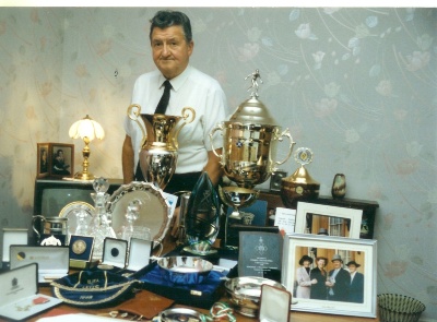Not St Bernards' trophies! Stewart Tulloch pictured with a collection of items held by the ASYFC that amalgamated in 2000 with other associations to form the Scottish Youth FA.