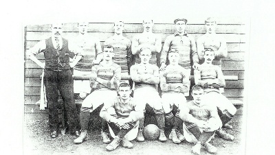 This old photograph taken around 1902 shows the St Bernards senior team wearing the Lord Rosebery colours. The jerseys were primrose and pink hoops. The Saints sported these colours for around three seasons. The Scotland international team wore the same colours around this time. 