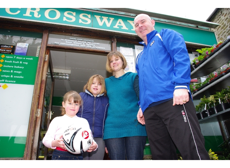 Manager Jiggy with Corrine Sheperd of sponsors Crossways General Store