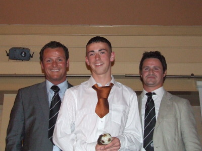 Under 14 Most Improved Player of the Year Stephen Rofe with Jim Magilton and Phil Mulryne