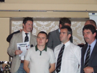Captain Sean Fennell with Danny McKee and Manager Artie Russell.