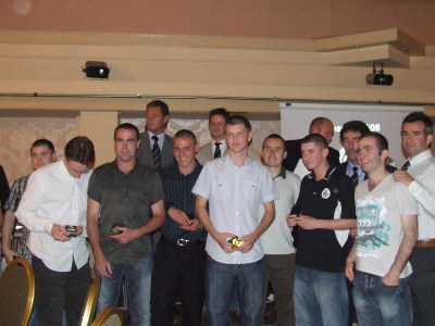 Some of the 1st team squad after receiving their League Winners medals from Phil Mulryne and Jim Magilton.