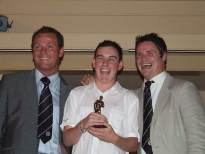 Under 18 Player of the Year Jody Lynch accepting his award from his Uncle Phil and Jim Magilton.