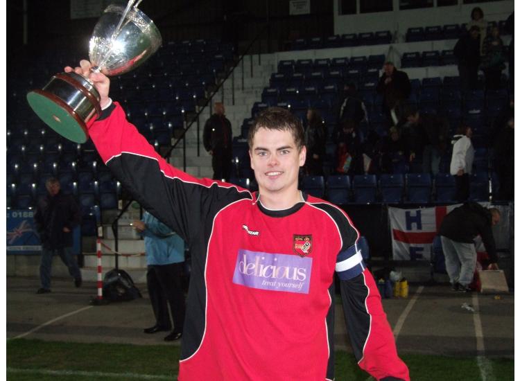 Captain Niall Magurie holds the Staffs FA Vase
