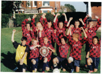Moorside High School do the double [with a little help from Swinton Boys]
League & Cup Winners 2003-2004
[the squad includes 5 swinton boys players]previously they had 9 swinton palyers 4 of whom left to go to other clubs during the 1st part of the season.the remaining players were 
andy gamble/johnathon may/adam cuthbert/josh randal/jamie phillips 