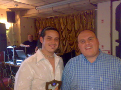 Rhondda League top goalscoer nicky McCarthy receives his award from Rhondda League Manager Bernie