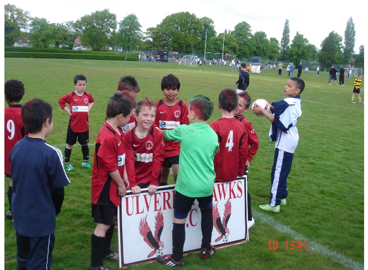 Team cherishing the cup winning moments