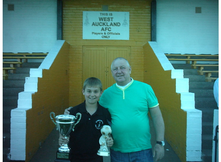 James White recieves his managers player from sponsor Geof Wright from Dunelm Property services