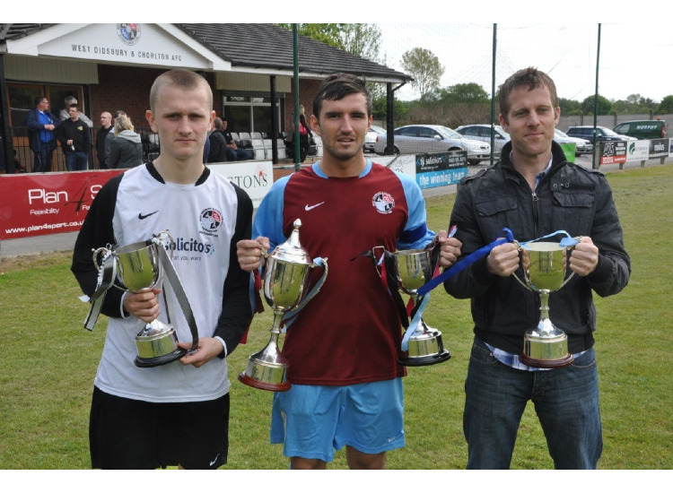 The Youth, First and Reserves team captians with the trophies 