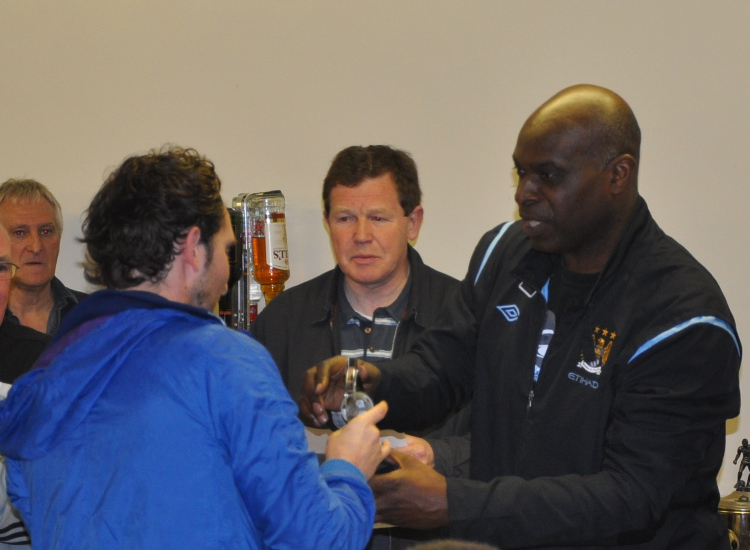 Ben Simpson receives the Reserves Player of the Year trophy