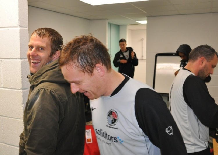 Woody sharing a joke with Paul Rowell