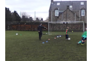 Guest Coach Gary Thompson directing operations