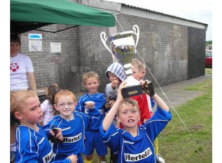 Aidan Smith raising the Workington leisure cup