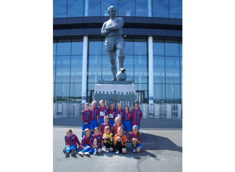 At the Sir Bobby Moore statue