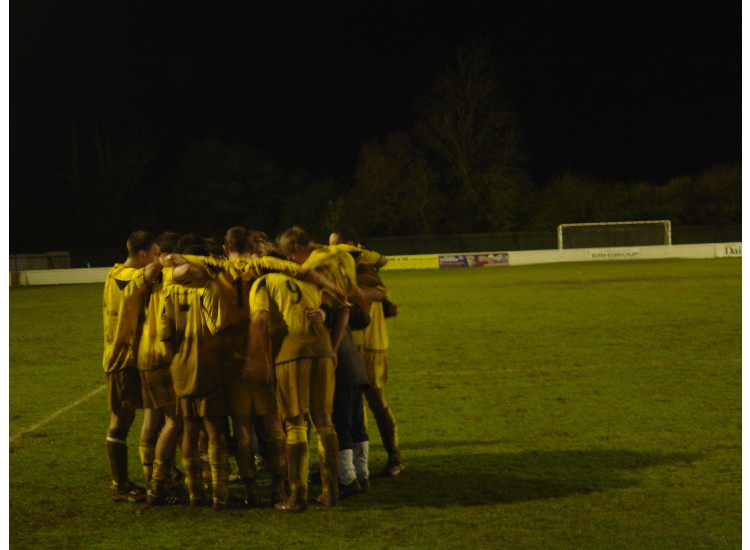 Team huddle after penalty shoot out win.