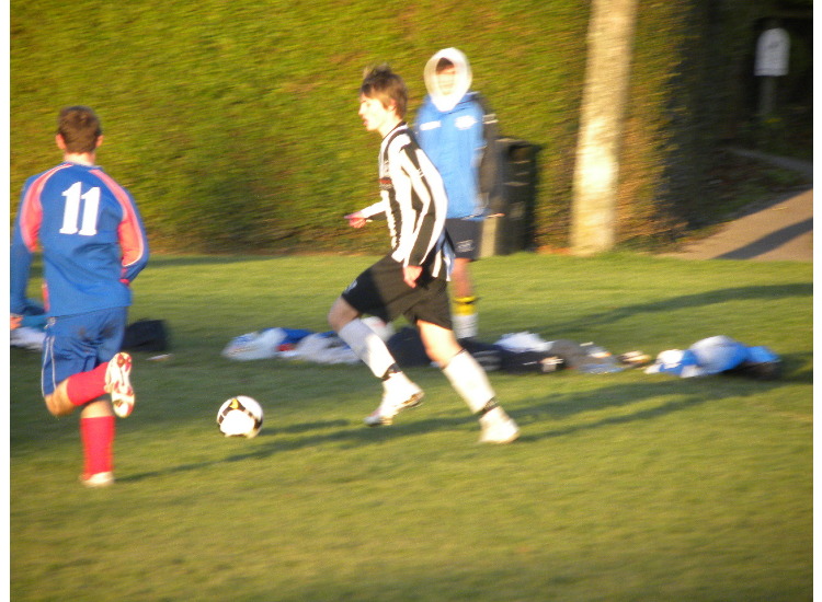 Josh Tennent bring the ball out of defence