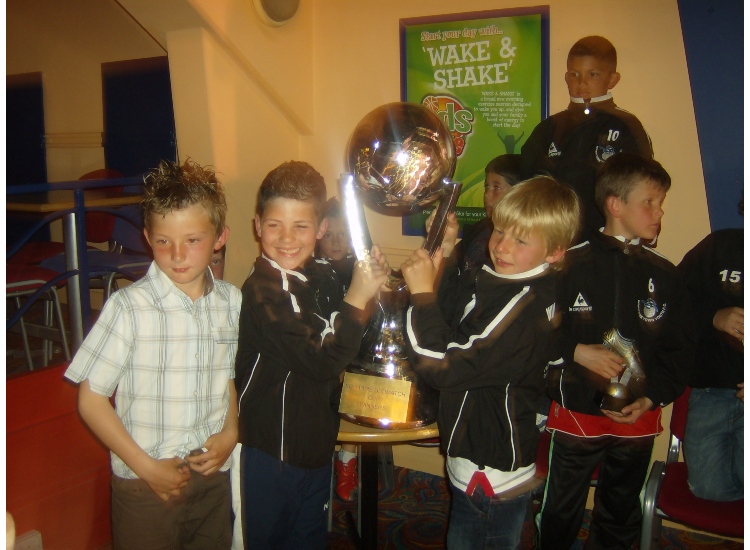 Daniel Hawkins, Diego Mora-Madden and Harry Waite with the  SCi Trophy Winners Trophy 2009/10
