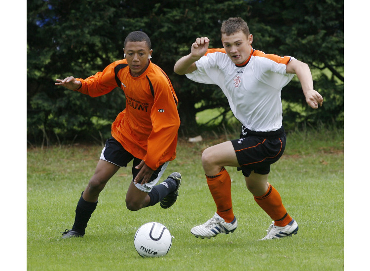 Dimitri Dunkley gets round his defender