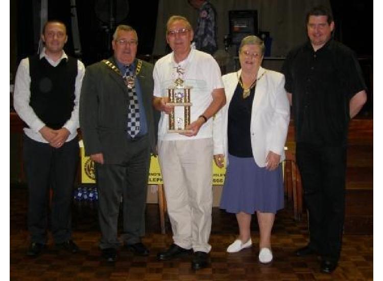 Jake's Grandad receives his award for the Under 10's Player of the season
